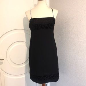 lbd black dress with velvet details and straps